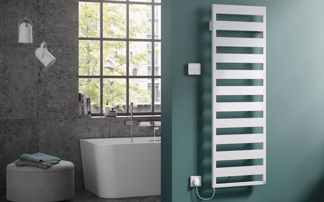 Interview mit Ursula Bolhuis: Das Foto zeigt einen Handtuchheizkörper, im Hintergrund steht eine Wanne.